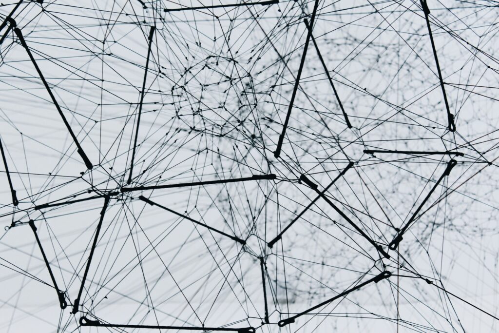 Abstract illustration of connected nodes representing a learning network in connectivism